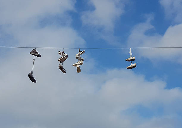 Shoe Tossing stock photo