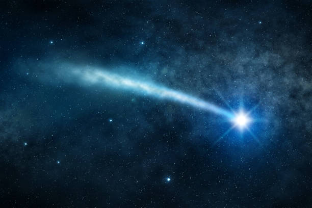 shooting star in the starry night sky stock photo