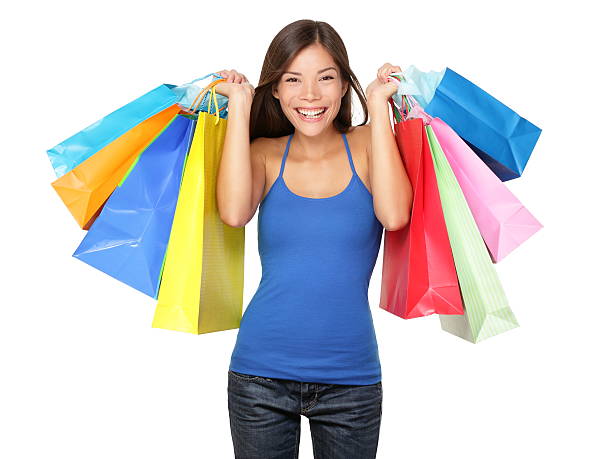 Shopper woman holding shopping bags stock photo