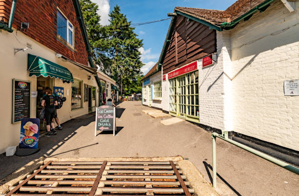 Shops and a cattle grid in Burley Burley, UK. Sunday 14 June 2020. People visit an ice cream shop and a cattle grid in Burley. cattle grid stock pictures, royalty-free photos & images