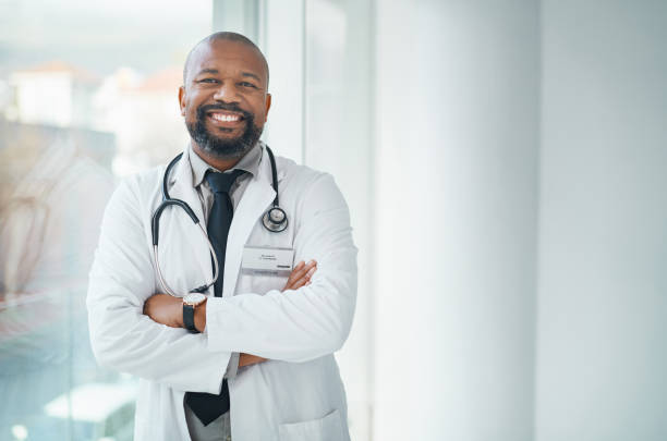 Shot of a confident mature doctor working in a modern hospital stock photo