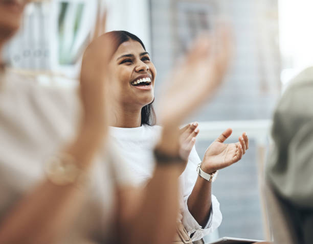 Shot of a group of people clapping and smiling during a meeting at work Feeling inspired corporate culture stock pictures, royalty-free photos & images
