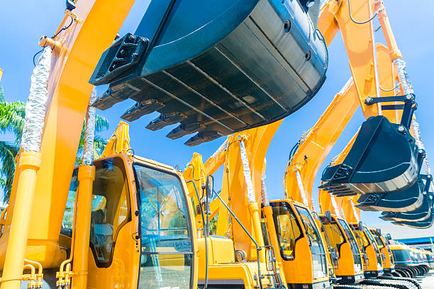 Shovel excavator on Asian machinery  rental company Asian Vehicle fleet with construction machinery of building or mining company construction equipment stock pictures, royalty-free photos & images