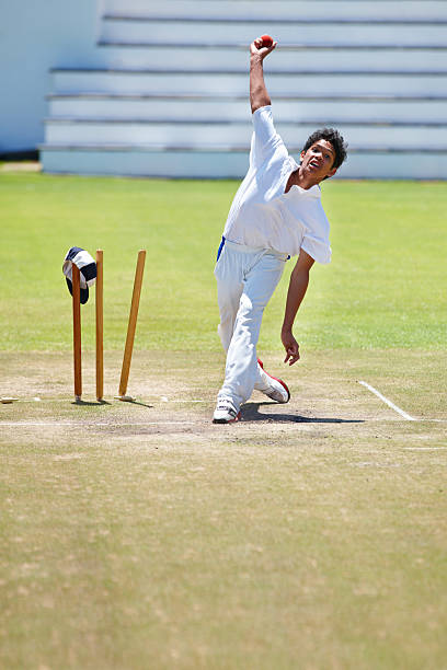 Shot of a young sportsman on a cricket...