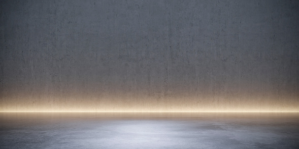 Concrete showroom with atmospheric direct light and empty space.