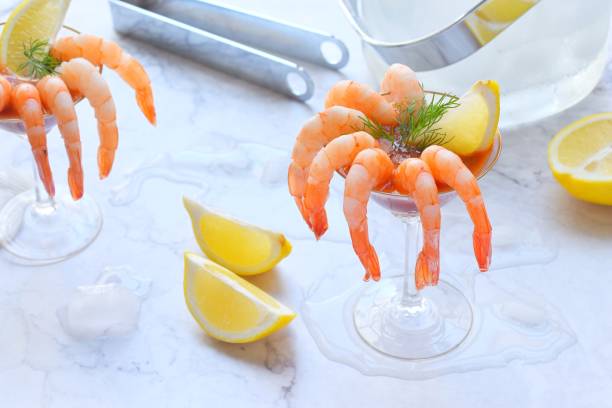 Shrimp cocktail Shrimp cocktail on a marble table shrimp cocktail stock pictures, royalty-free photos & images