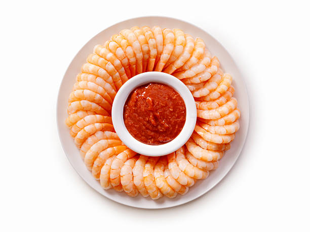 Shrimp Ring with Cocktail Sauce Shrimp Ring with Cocktail Sauce -Photographed on Hasselblad H3D2-39mb Camera shrimp cocktail stock pictures, royalty-free photos & images