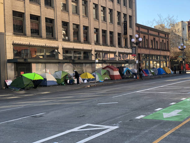 Shutdown Tents lining the street in Seattle during the Covid-19 shutdown. homelessness stock pictures, royalty-free photos & images