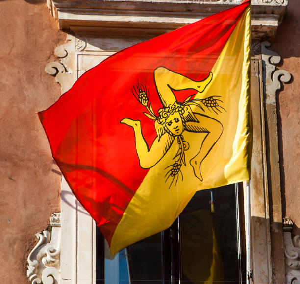 Sicily symbol of three legs representing three corners of the island depicted on flag stock photo