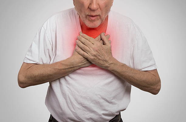 sick old man, elderly guy, having severe infection, chest pain stock photo