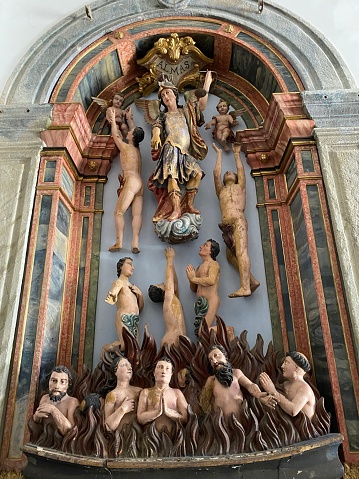 Side altar devoted to the lost souls in Purgatory. Baroque Convent Church of Saint Benedict, Viana do Castelo, Portugal.