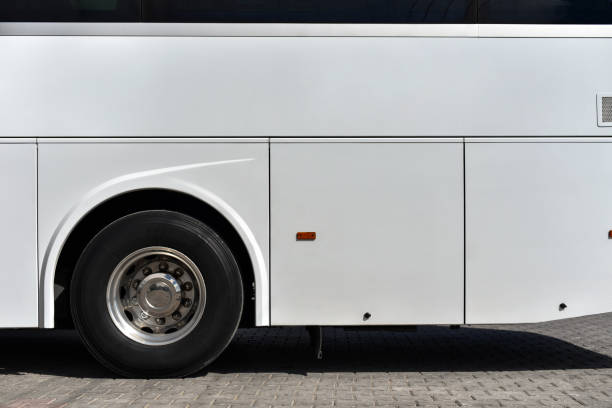 side of a white bus stock photo