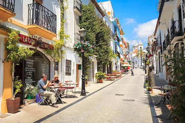 Side street in Marbella Old Town with bars and restaurants stock photo