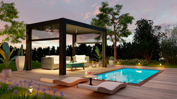 Side view 3D render of black outdoor pergola on deck next to swimming pool at sunset stock photo