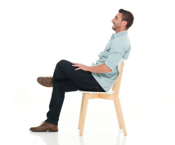 座る 横向き 男性のストックフォト Istock
