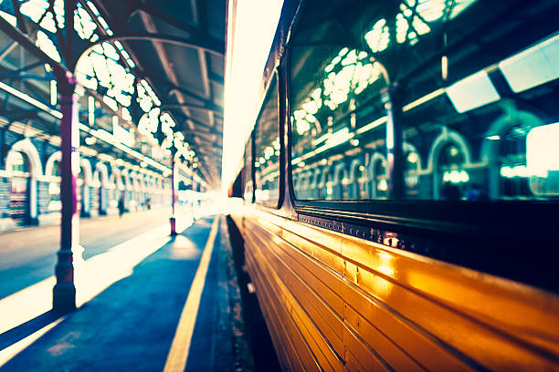 Side view of train at Dunedin station, New Zealand stock photo
