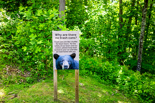 Seven Devils, USA - June 4, 2021: Sign at Otter Falls trail for trash free park and cans are not provided due to problems with black bears eating