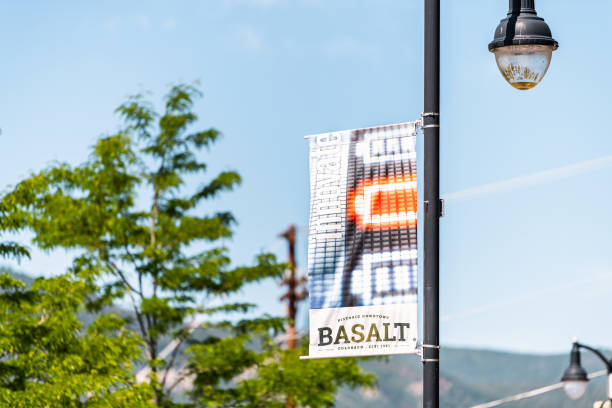 Sign banner on lamp post for historic downtown of small town city in outdoor summer street Basalt, USA - July 14, 2019: Closeup of sign banner on lamp post for historic downtown of small town city in outdoor summer street basalt stock pictures, royalty-free photos & images