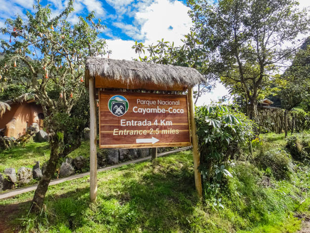 Sign for Cayambe-Coca National Park showing the distance stock photo