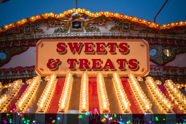 Sign for sweet & treat shop at Christmas market winter wonderland Sign for sweet & treat shop at Christmas market winter wonderland in London candy store stock pictures, royalty-free photos & images