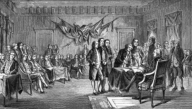 Signing the Declaration of Independence in Philadelphia Engraving of "Signing the Declaration of Independence" published in "Popular Descriptive Portraiture of The Great Events of Our Past Century" by R.M. Devens in 1877. The engraving is now in the public domain. declaration of independence stock pictures, royalty-free photos & images