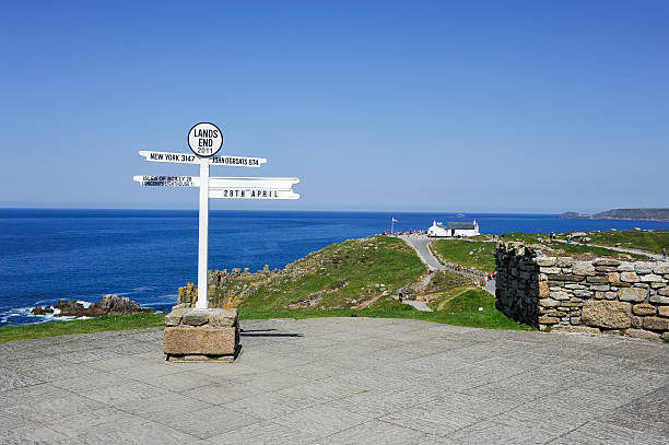 Signpost at Lands End in Cornwall, UK stock photo