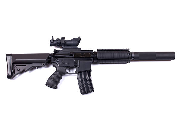 Silenced M4 assault rifle stock photo