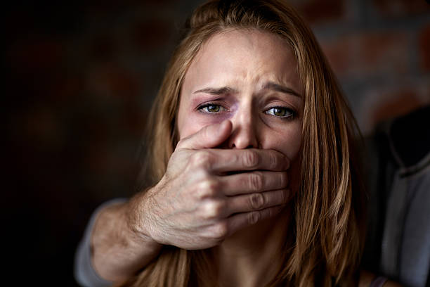 Silent destroyer Abused young woman being silenced by her abuserhttp://195.154.178.81/DATA/i_collage/pi/shoots/781140.jpg abuse stock pictures, royalty-free photos & images