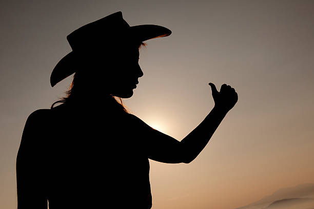 Female Hitchhiker Silhouette Stock Photos, Pictures & Royalty-Free ...