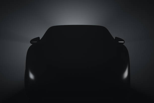 Silhouette of an unrecognizable car prototype. Front view. Automotive stock photo