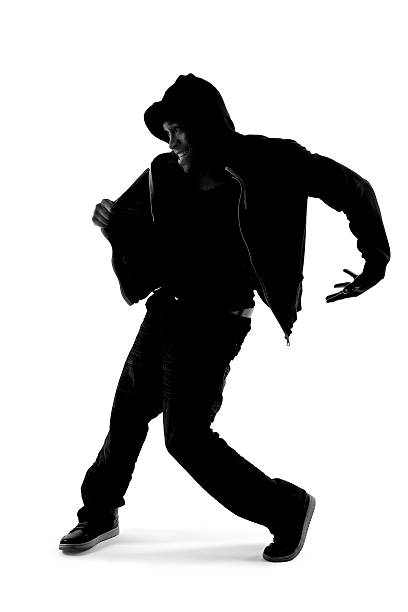 Silhouette of Hip Hop Dancer stock photo