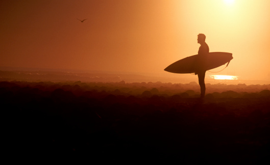 Silhouette Of Surfer Stock Photo - Download Image Now - iStock