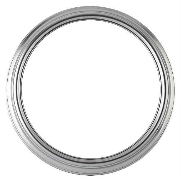 A silver circular frame on a white background stock photo