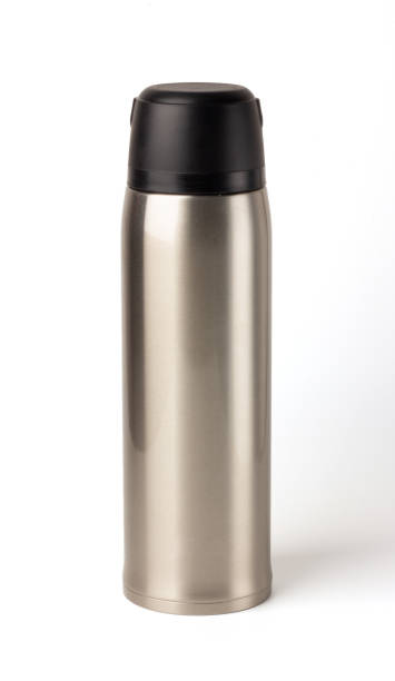 Silver empty glossy metal vacuum thermo tumbler flask isolated on a white background stock photo
