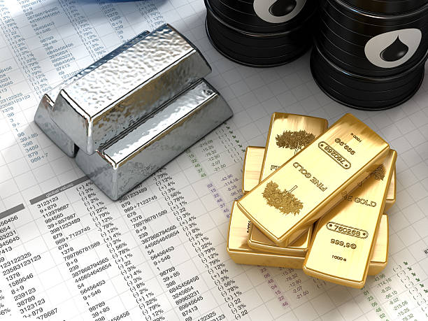 Silver, gold and oil "Silver, gold ingots with oil barrels on fictitious financial datas.Similar images:" gold bar stock pictures, royalty-free photos & images