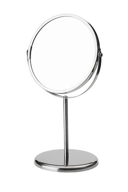silver makeup mirror isolated on white with clipping path silver makeup mirror isolated on white with clipping path mirror object stock pictures, royalty-free photos & images