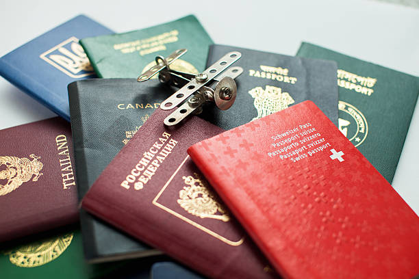 silver plane landed on passports - russia usa ukraine stockfoto's en -beelden