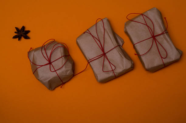Simple gifts wrapped in paper stock photo
