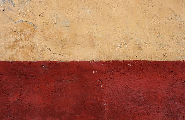 Simple Wall Texture Part of an old painted adobe wall from Budapest 15th district. adobe backgrounds stock pictures, royalty-free photos & images