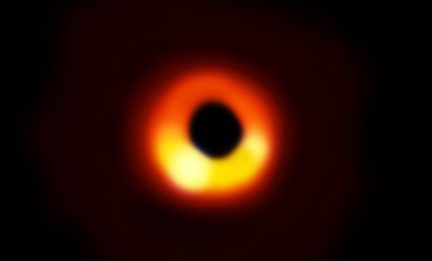 simulatin of a black hole in the dark space stock photo