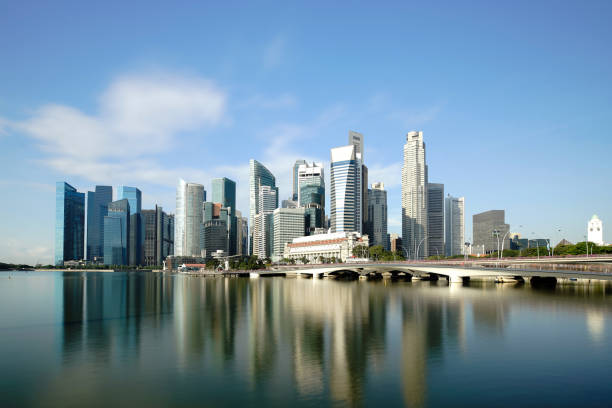 Singapore business district skyline financial downtown building with tourist sightseeing in day at Marina Bay, Singapore. Asian tourism, modern city life, or business finance and economy concept stock photo