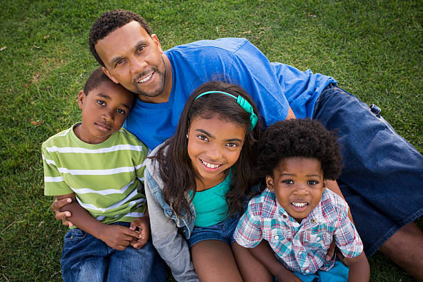 Single dad with kids stock photo