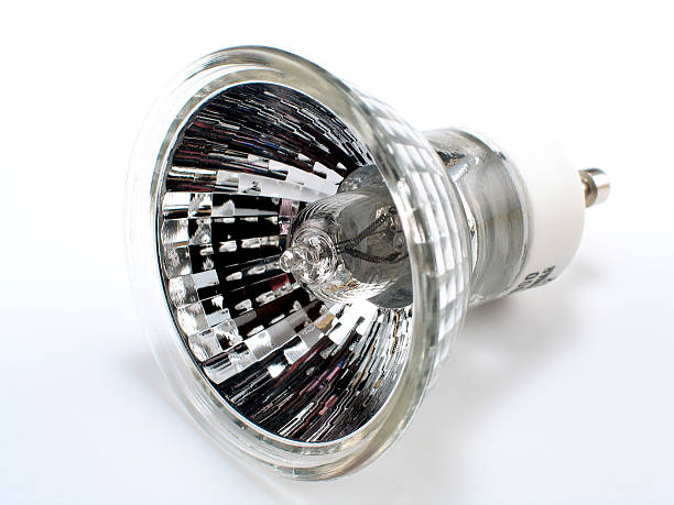 A single halogen spotlight bulb A small halogen spot light.To view my Industrial related images halogen light stock pictures, royalty-free photos & images