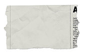 istock Single newspaper tear - on white 157293816