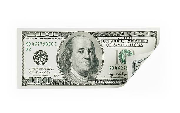 Single One Hundred US Dollar Bill on White Single one hundred us dollar bill isolated on white background. The banknote is curled from the lower right corner. Clipping path is included. american one hundred dollar bill stock pictures, royalty-free photos & images
