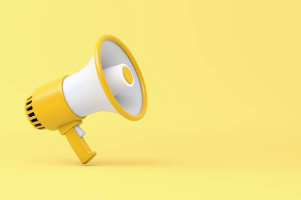 Single yellow and white electric megaphone with a handle stands on a yellow background 3d illustration audio electronics stock pictures, royalty-free photos & images