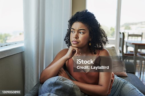 istock Sitting with the worries of an uncertain future 1309050890