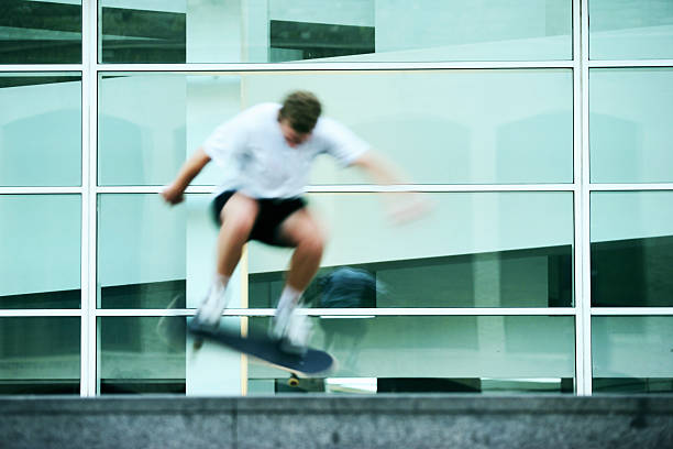skater in action! - energetic jumping bokeh bildbanksfoton och bilder