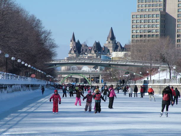 Skating on the Rideau Canal during Winterlude in Ottawa, Canada. stock photo