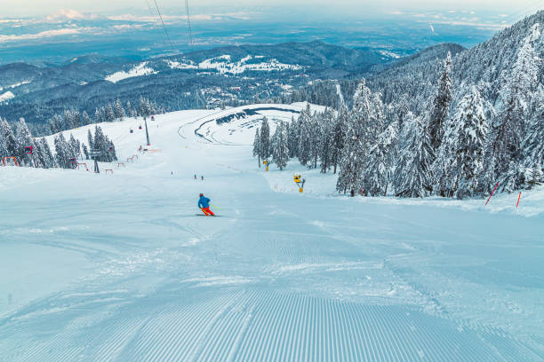 Ski exerciseing on the ski slope, Poiana Brasov, Transylvania, Romania stock photo
